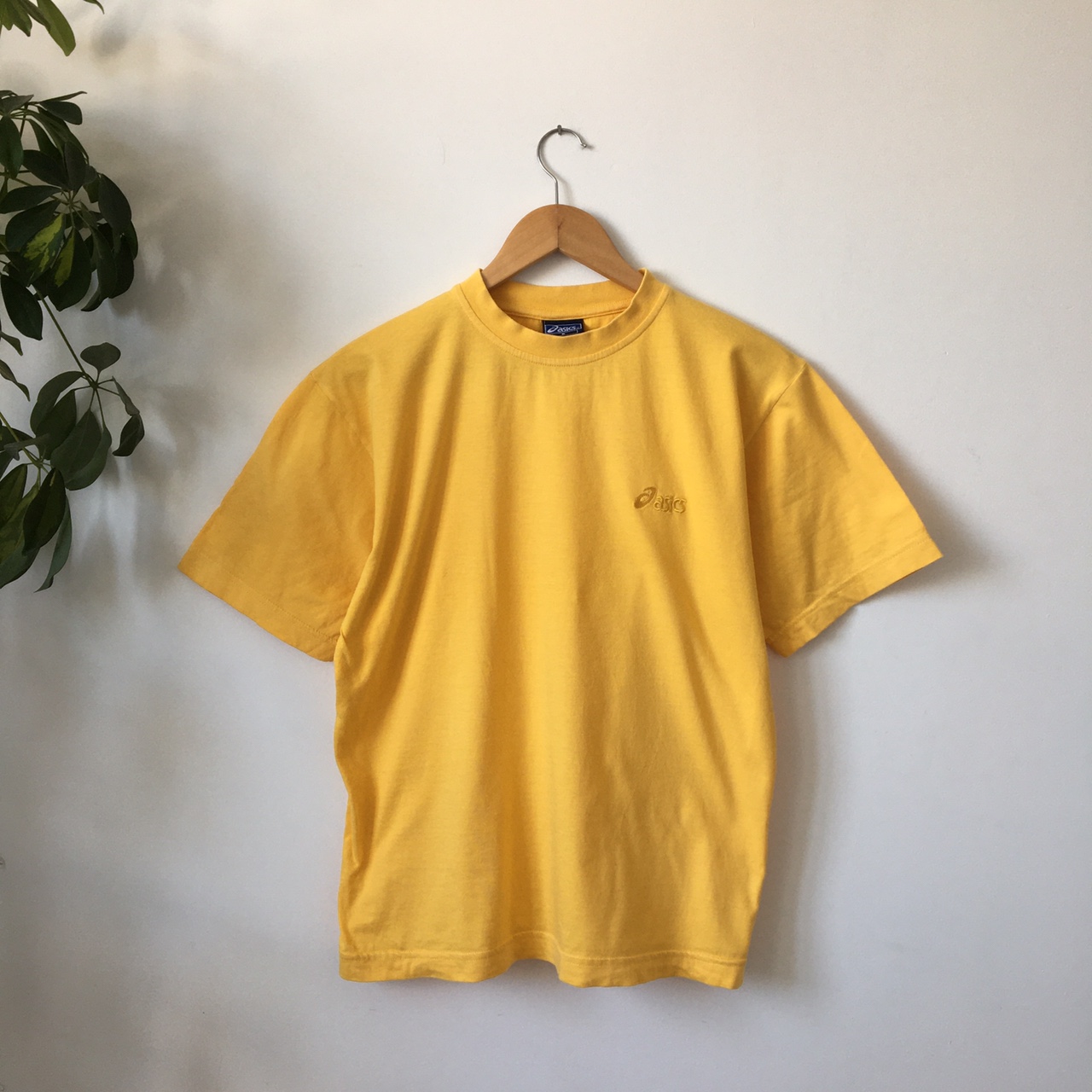 Yellow ASICS t-shirt